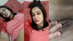 Hot desi girl strips naked and rubs her wet pussy